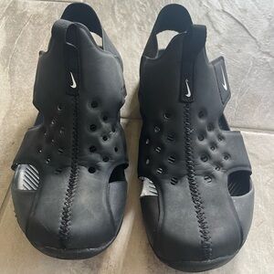 Nike Black Perforated Slip-Ons